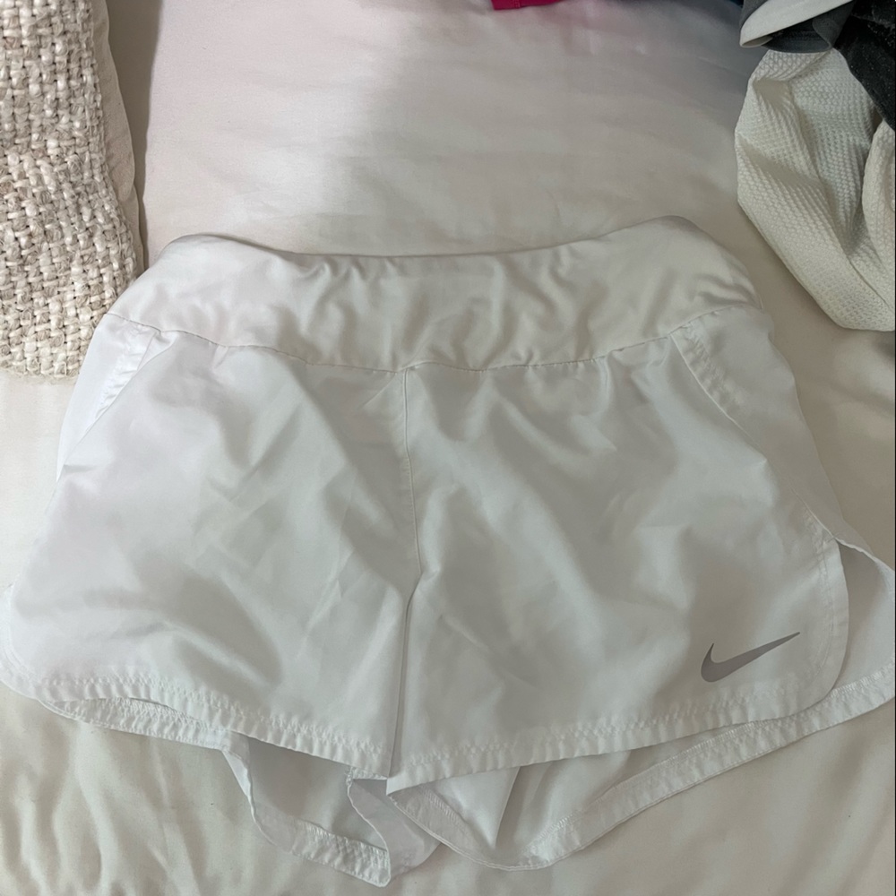 White Nike shorts